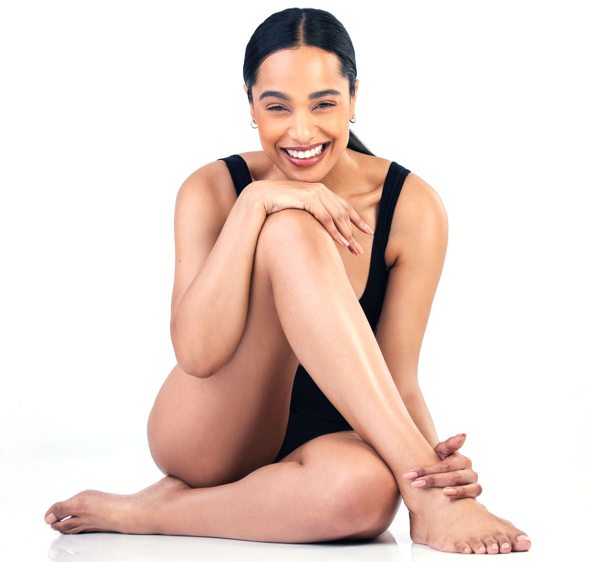 Permanent-Hair-Removal-in-Seattle-Washington Smiling woman with smooth, hair free legs.